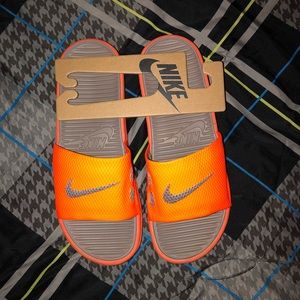 mens orange nike slides
